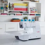 Bernette B62 Airlock Coverstitch Machine Bundle | Air Threader, Scissors, Rotary Cutter, Threads, Self Healing Foldable Cutting Mat, LED Light, Extension Table | Heavy Duty, Beginner to Professional